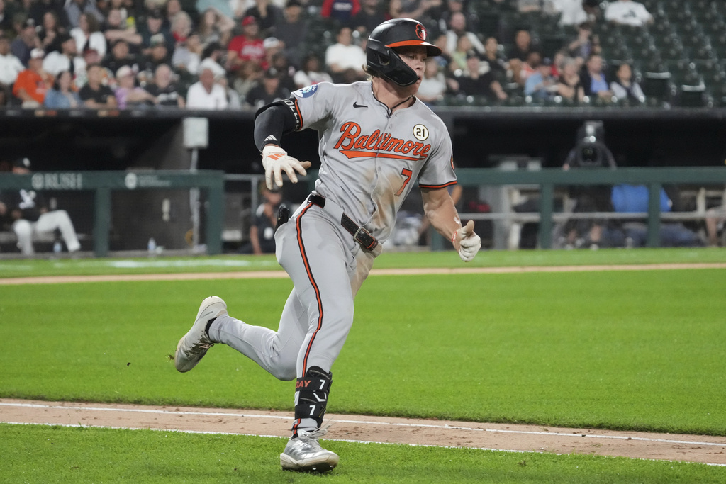 Baltimore Orioles' Jackson Holliday runs after hitting a double during the sixth inning of a baseball game against the Chicago White Sox in Chicago, Monday, Sept. 15, 2025. (AP Photo/Nam Y. Huh)