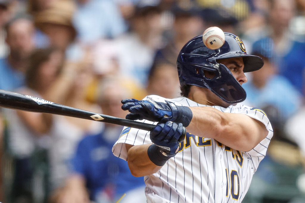Milwaukee Brewers' Sal Frelick fouls off a pitch from the Texas Rangers during the fifth inning of a baseball game Sunday, Aug. 30, 2026, in Milwaukee. (AP Photo/Jeffrey Phelps)