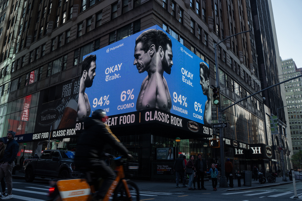 FILE - Advertisements by the American company Polymarket predict a victory for Zohran Mamdani in the New York City mayoral election, Nov. 4, 2025, in New York. (AP Photo/Olga Fedorova, File)