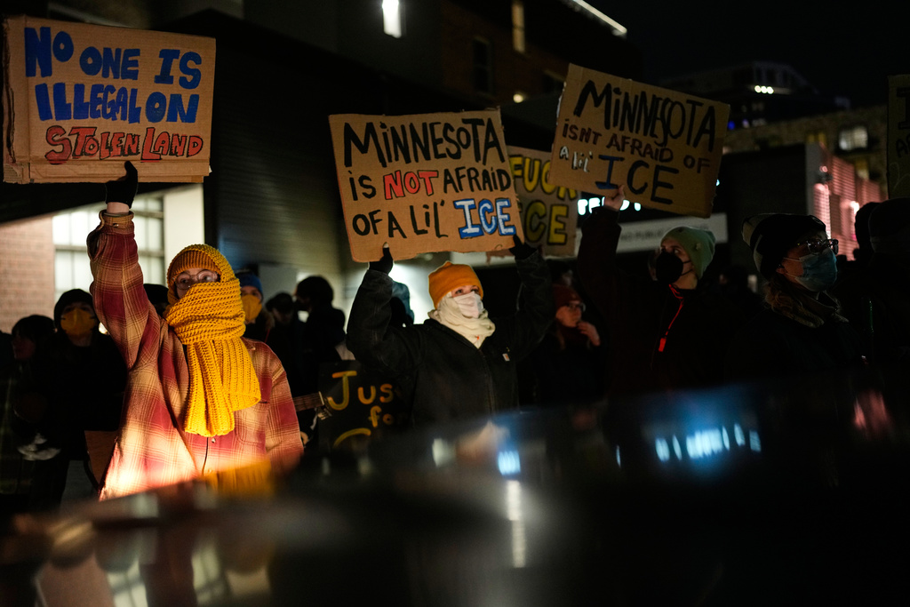 People participate in a protest and noise demonstration calling for an end to federal immigration enforcement operations in the city, Friday, Jan. 9, 2026, in Minneapolis. (AP Photo/John Locher)