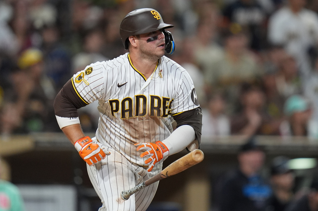 San Diego Padres' Ty France watches his RBI double during the sixth inning of a baseball game against the Miami Marlins Saturday, Sept. 19, 2026, in San Diego. (AP Photo/Gregory Bull)