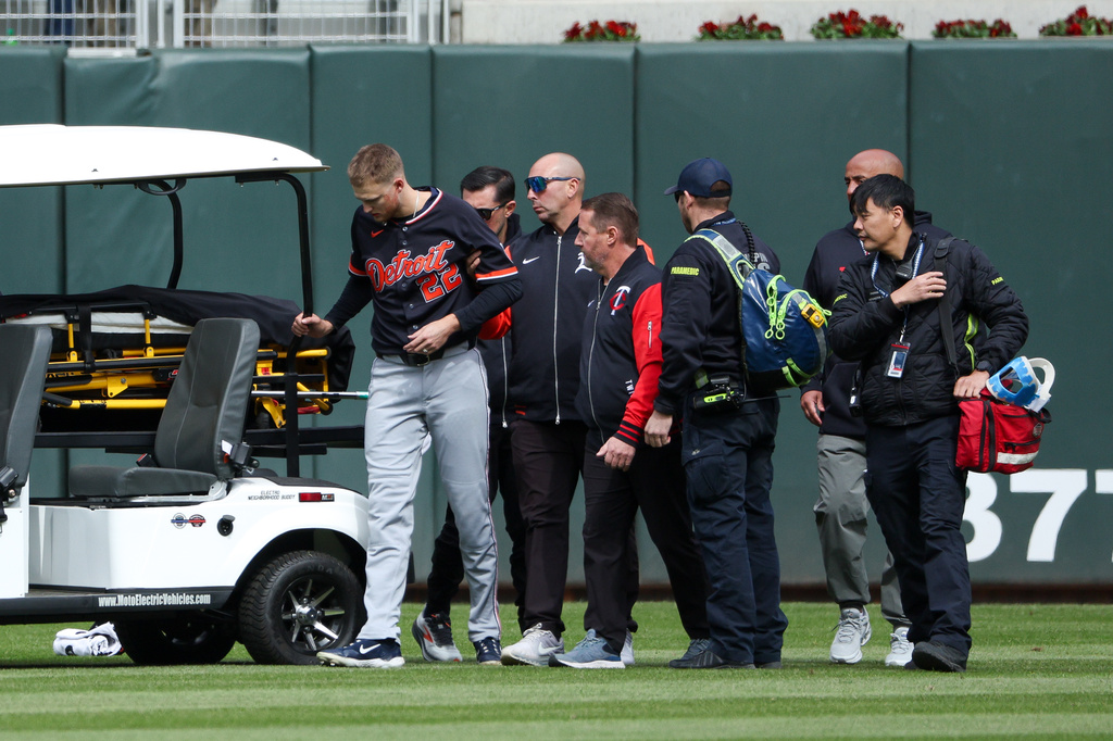 Detroit Tigers center fielder Parker Meadows is helped off the field after a collision with left fielder Riley Greene during the eighth inning of baseball game against the Minnesota Twins, Thursday, April 9, 2026, in Minneapolis. (AP Photo/Matt Krohn)