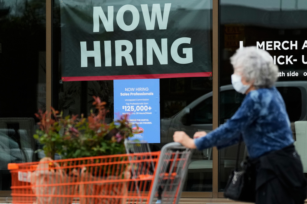 FILE - Hiring sign for sales professionals is displayed at a store, in Vernon Hills, Ill., Wednesday, April 15, 2026. (AP Photo/Nam Y. Huh, file)