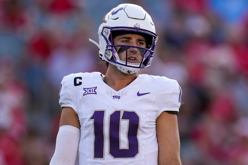 FILE - TCU quarterback Josh Hoover (10), who has since transferred to Indiana, plays against Houston during the first half of an NCAA college football game, Saturday, Nov. 22, 2025, in Houston. (AP Photo/Eric Christian Smith,File)