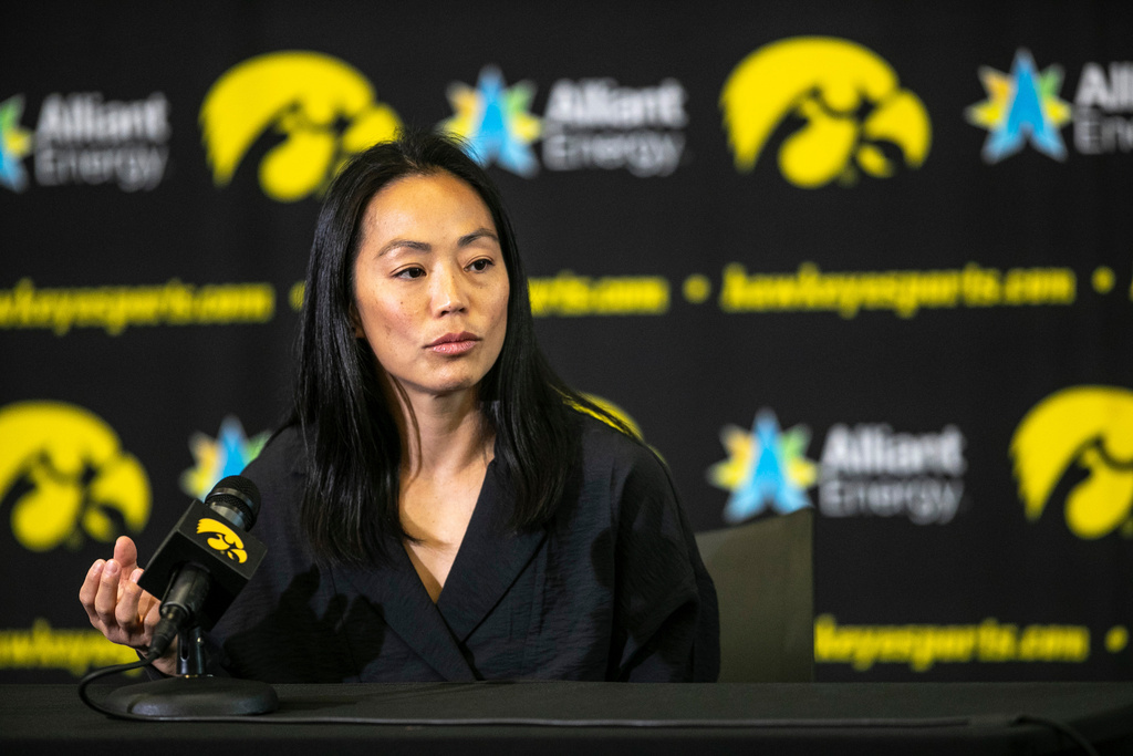 FILE - Iowa women's wrestling head coach Clarissa Chun answers reporters' questions during the Hawkeyes women's wrestling media day on Wednesday, Oct. 18, 2023, at Carver-Hawkeye Arena in Iowa City, Iowa. (Geoff Stellfox/The Gazette via AP, File)