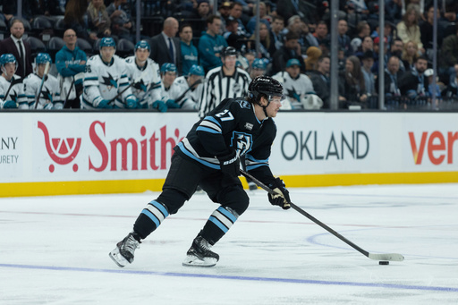 Utah Mammoth center Barrett Hayton (27) skates with the puck against San Jose Sharks during the first period of an NHL hockey game Friday, Oct. 17, 2025, in Salt Lake City. (AP Photo/Melissa Majchrzak) Utah Mammoth center Barrett Hayton (27) skates with the puck against San Jose Sharks during the first period of an NHL hockey game Friday, Oct. 17, 2025, in Salt Lake City. (AP Photo/Melissa Majchrzak)