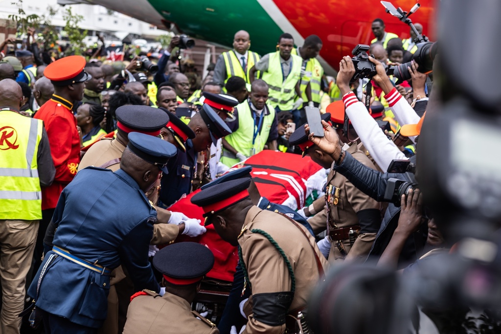 The body of Kenya's former Prime Minister Raila Odinga arrives in Nairobi, Kenya, a day after he died in India, Thursday, Oct. 16, 2025. (AP Photo/Samson Otieno)