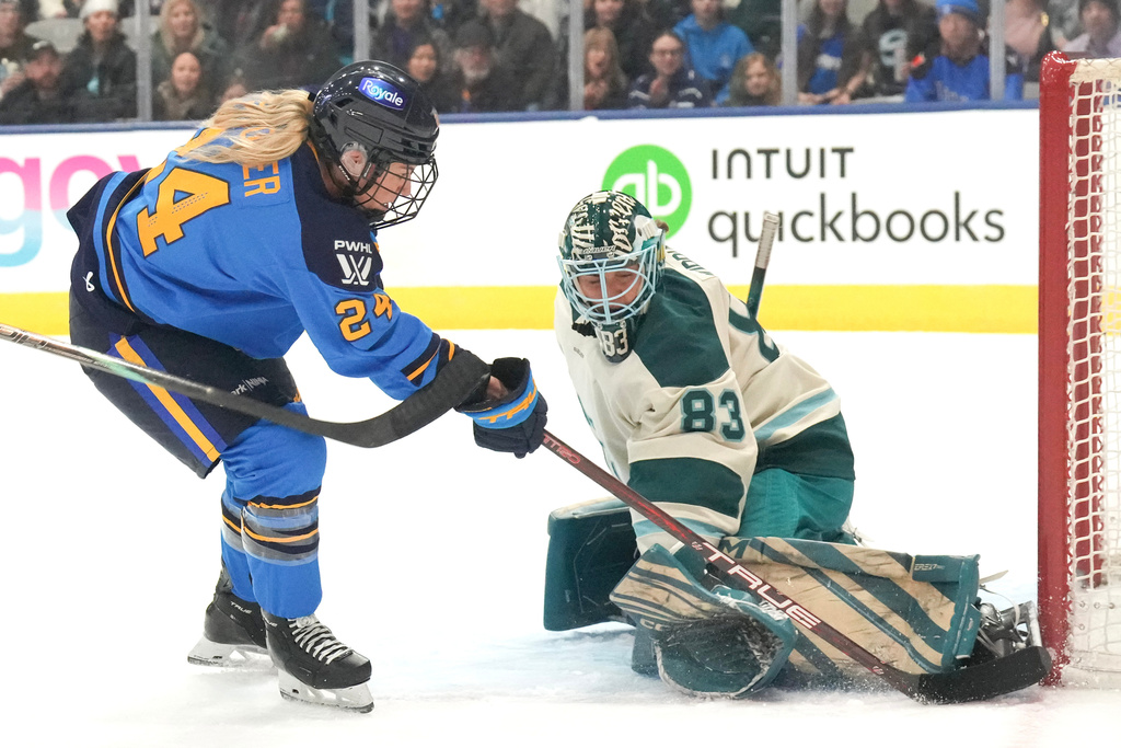 Toronto Sceptres forward Natalie Spooner (24) shoots against Seattle Torrent goaltender Hannah Murphy (83) during second-period PWHL hockey game action in Toronto, Sunday March 15, 2026. (Chris Young/The Canadian Press via AP)