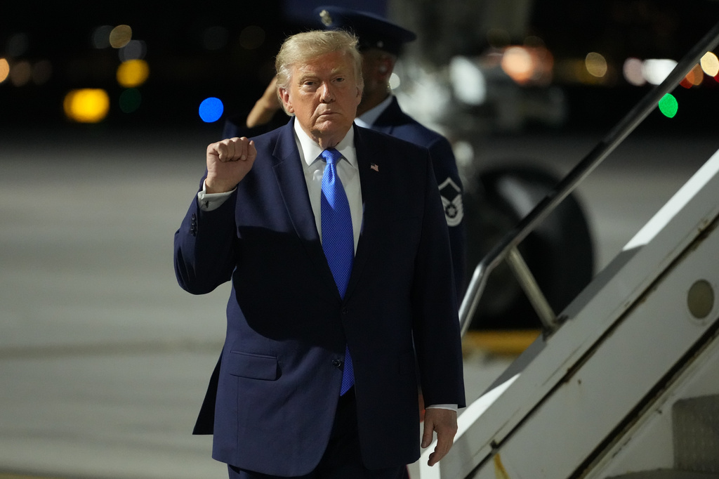 President Donald Trump arrives on Air Force One at Harry Reid International Airport in Las Vegas, Tuesday, Aug. 4, 2026. (AP Photo/Mark Schiefelbein)