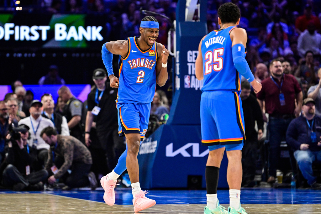 Oklahoma City Thunder guard Shai Gilgeous-Alexander (2) celebrates during the first half of an NBA basketball game against the Denver Nuggets Monday, Mar. 9, 2026, in Oklahoma City. (AP Photo/Gerald Leong)
