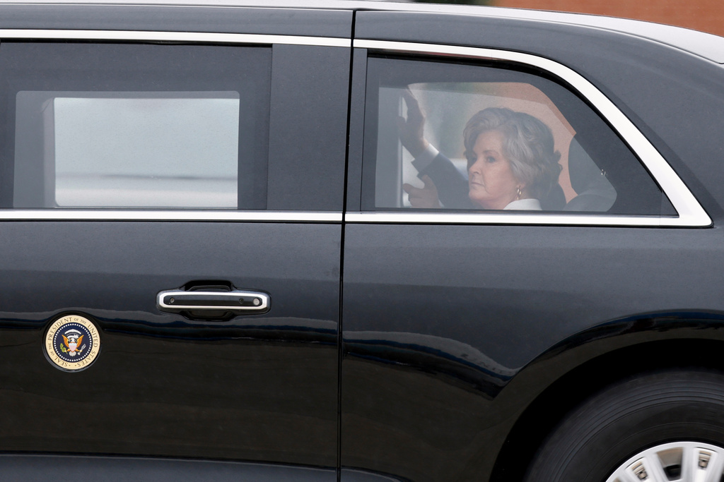 FILE - White House chief of staff Susie Wiles is seen with President Donald Trump in his limousine upon their arrival at Joint Base Andrews, Md., Oct. 12, 2025. (AP Photo/Luis M. Alvarez, File)