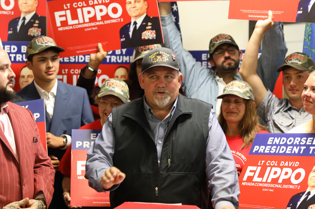 David Flippo, a Republican candidate for Congress in Nevada's 2nd district, speaks during a primary election night watch party Tuesday, June 9, 2026, in Reno, Nev. (AP Photo/William Hale Irwin)