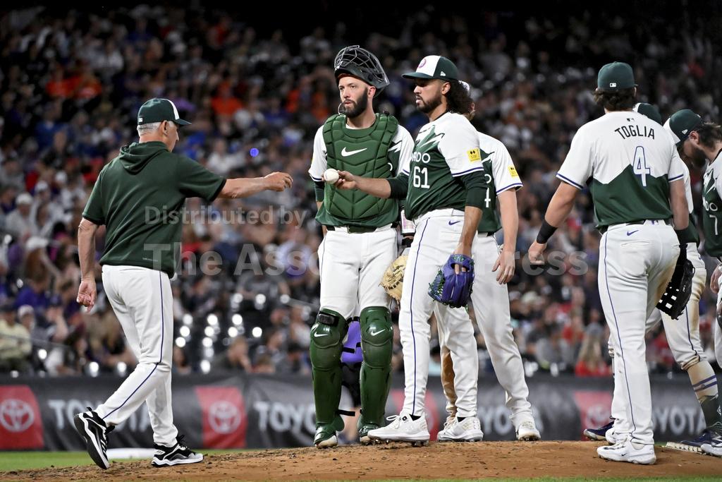 Ryan McMahon draws basesloaded walk on pitchclock violation, Rockies