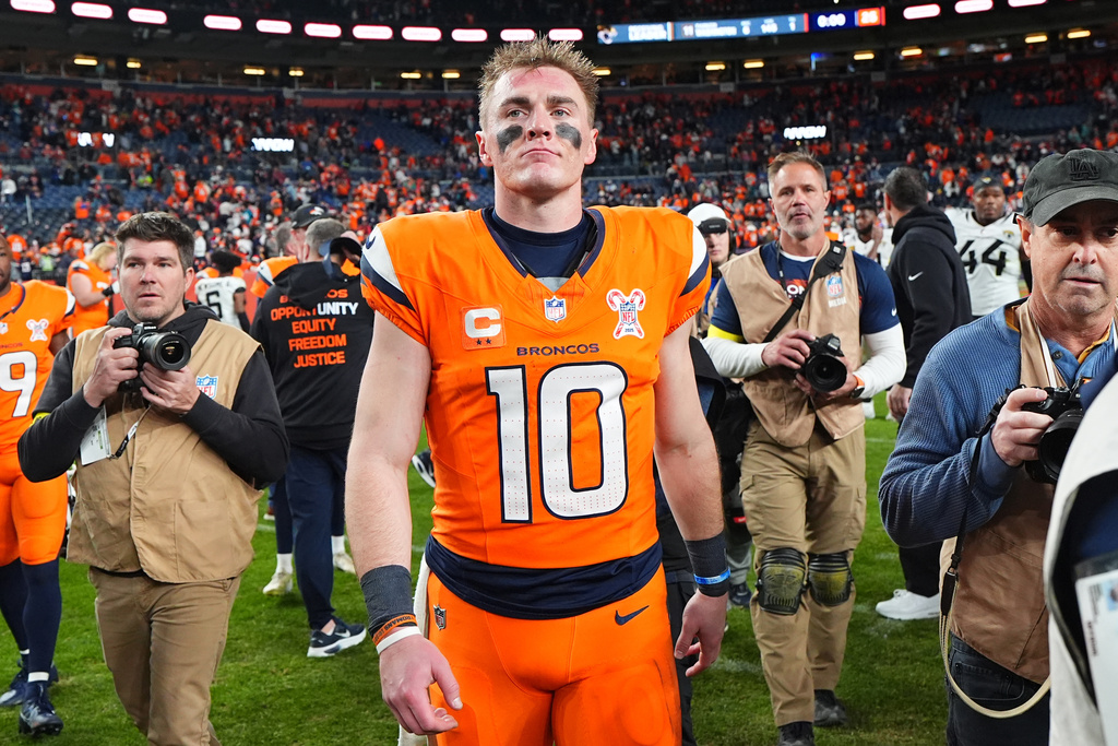 Denver Broncos quarterback Bo Nix (10) leaves the field after an NFL football game against the Jacksonville Jaguars in Denver, Sunday, Dec. 21, 2025. (AP Photo/Jack Dempsey)
