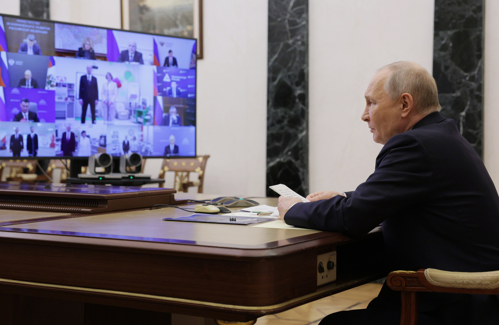 Russian President Vladimir Putin leads a cabinet meeting via videoconference at the Kremlin in Moscow, Wednesday, March 4, 2026. (Gavriil Grigorov/Sputnik, Kremlin Pool Photo via AP)