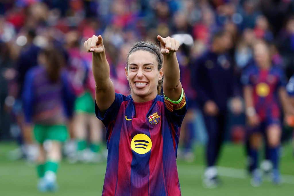 Barcelona's Alexia Putellas gestures towards the fans at the end of the women's Champions League semifinal soccer match between FC Barcelona and FC Bayern Munich in Barcelona, Spain, Sunday, May 3, 2026. (AP Photo/Joan Monfort)