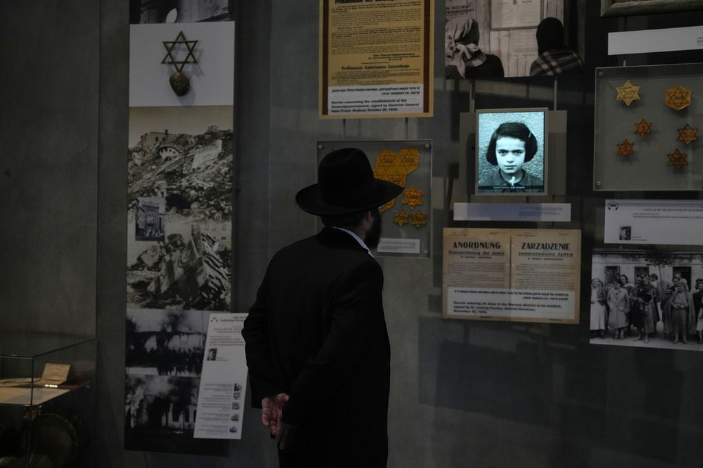 People visit the Yad Vashem Holocaust Memorial Museum in Jerusalem, Tuesday, April 14, 2026, as the annual Israeli memorial day for the 6 million Jews killed in the Holocaust of World War II begins at sundown on Sunday. (AP Photo/Ohad Zwigenberg)