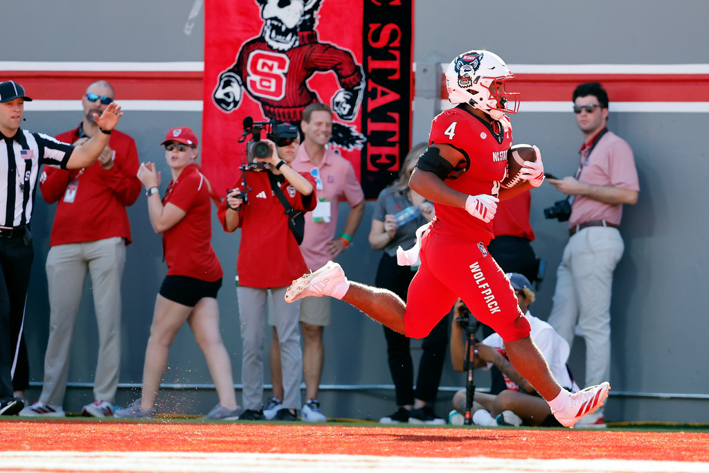 North Carolina State's Jayden Scott scores a touchdown against Campbell during the first half of an NCAA college football game in Raleigh, N.C., Saturday, Oct. 4, 2025. (AP Photo/Karl DeBlaker)