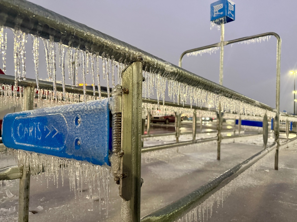 Icicles form during a winter storm at a grocery store parking lot Sunday, Jan. 25, 2026, in Nitro, West Virginia. (AP Photo/John Raby)