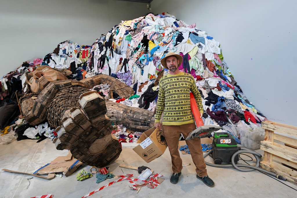Danish recycling artist Thomas Dambo poses for a photograph in his new exhibit "The Garbage Man" at Arken Museum of Contemporary Art in Ishoj, Denmark, May 14, 2026. (AP Photo/James Brooks)