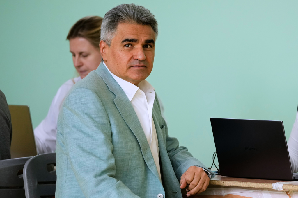 The New People's party leader Alexei Nechayev waits to receive a ballot to vote in the parliamentary election in Moscow, Saturday, Sept. 19, 2026. (AP Photo/Pavel Bednyakov) CAPTION CORRECTION: Corrects spelling of first name from Alexey to Alexei