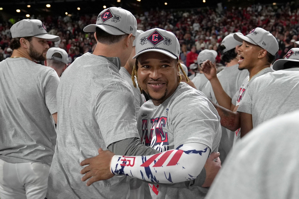 Cleveland Guardians third baseman Jos&eacute; Ram&iacute;rez, center, celebrates after Game 5 of baseball's American League Division Series against the Chicago White Sox, Saturday, Oct. 10, 2026, in Cleveland. (AP Photo/Sue Ogrocki)