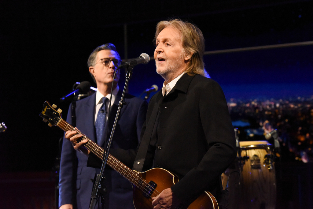 This image released by CBS shows Paul McCartney, right, with host Stephen Colbert during the final episode of "The Late Show with Stephen Colbert" in New York on Thursday, May 21, 2026. (Scott Kowalchyk/CBS via AP)