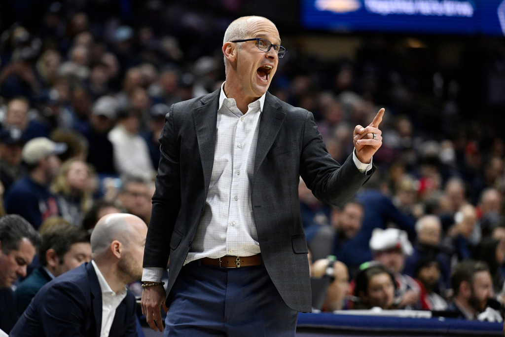 UConn head coach Dan Hurley calls to his team in the second half of an NCAA college basketball game against Marquette, Sunday, Jan. 4, 2026, in Storrs, Conn. (AP Photo/Jessica Hill)