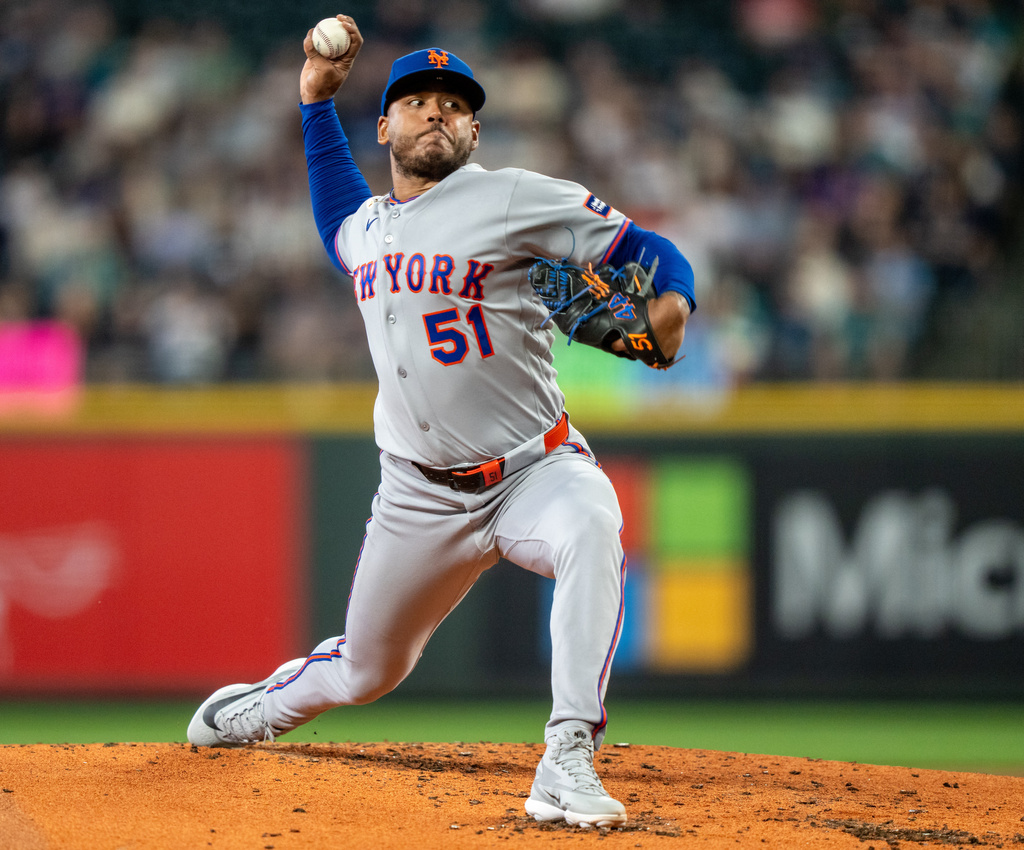 New York Mets starter Freddy Peralta delivers a pitch during the second inning of a baseball game against the Seattle Mariners, Wednesday, June 3, 2026, in Seattle. (AP Photo/Stephen Brashear)