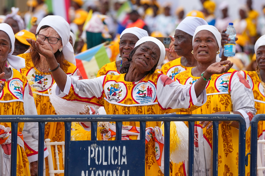 Faithful wait for the arrival of Pope Leo XIV at the Basilica of the Immaculate Conception, on the 10th day of his 11-day pastoral visit to Africa, in Mongomo, Equatorial Guinea, Wednesday, April 22, 2026. (AP Photo/Misper Apawu)