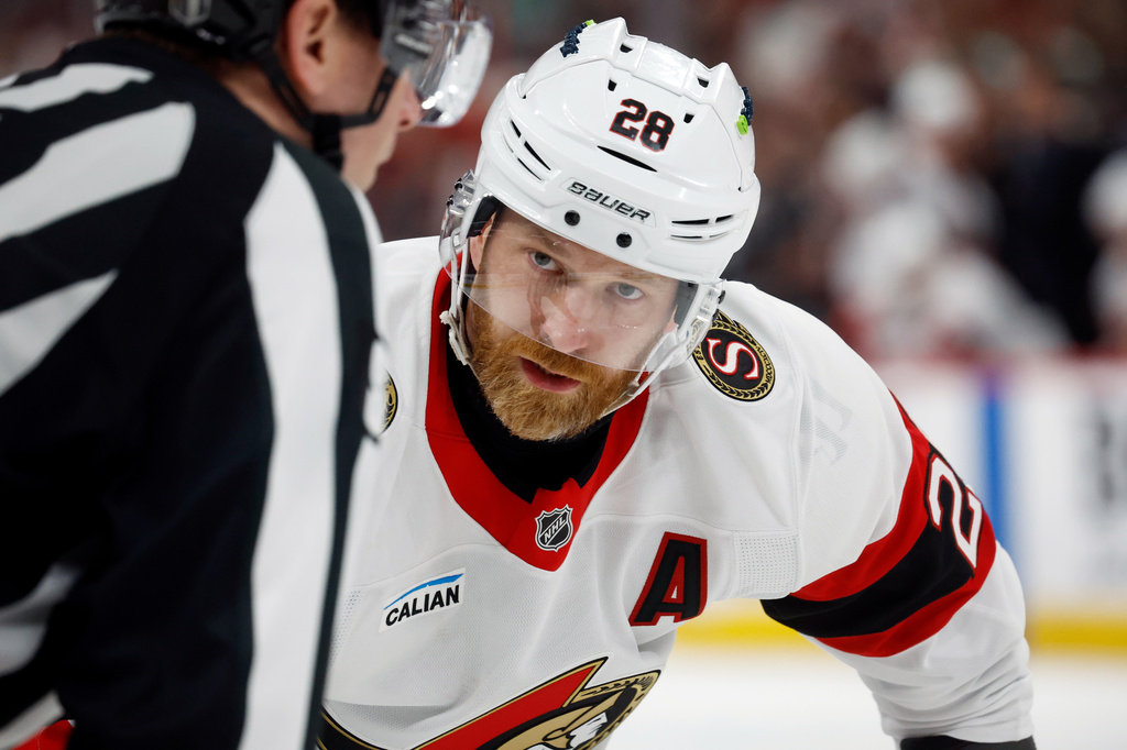 FILE - Ottawa Senators' Claude Giroux (28) waits for a face-off against the Carolina Hurricanes during the third period of an Game 1 of an NHL hockey Stanley Cup first-round playoff series in Raleigh, N.C., Saturday, April 18, 2026. (AP Photo/Karl DeBlaker,File)
