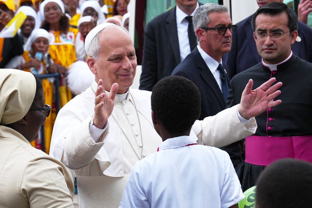 Pope Leo XIV arrives at the Basilica of the Immaculate Conception on the 10th day of his 11-day pastoral visit to Africa, in Mongomo, Equatorial Guinea, Wednesday, April 22, 2026. (AP Photo/Misper Apawu)