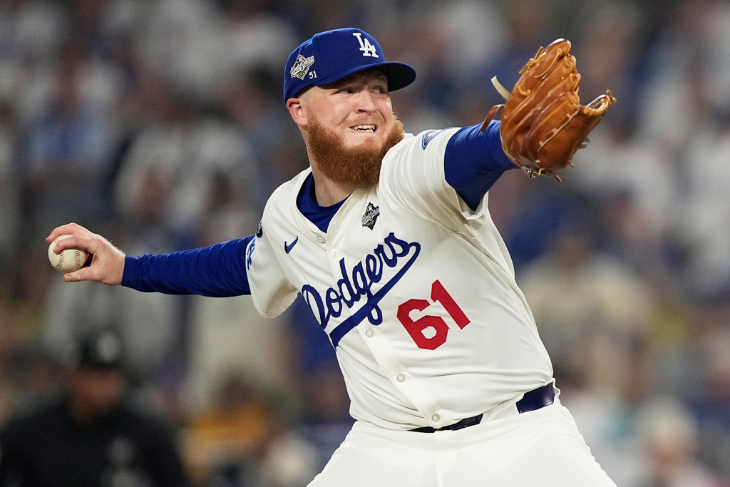 Los Angeles Dodgers pitcher Will Klein throws against the Toronto Blue Jays during the 15th inning in Game 3 of baseball's World Series, Monday, Oct. 27, 2025, in Los Angeles. (AP Photo/Brynn Anderson)