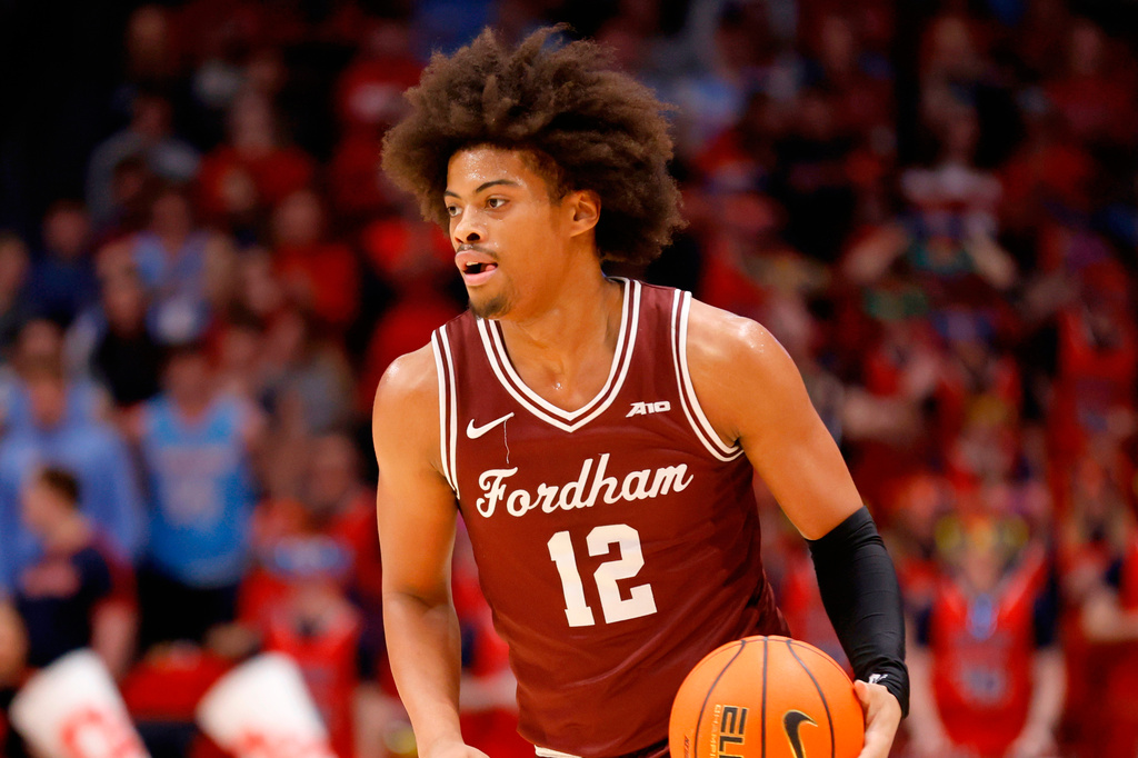 FILE - Fordham forward Elijah Gray drives against Dayton during an NCAA college basketball game in Dayton, Ohio, Saturday, Feb. 17, 2024. (AP Photo/Paul Vernon, File)