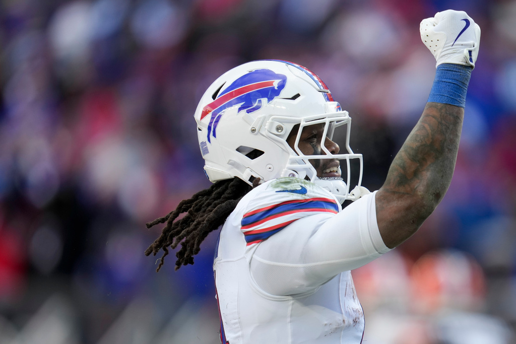 Buffalo Bills running back James Cook III celebrates his touchdown against the Cleveland Browns during the first half of an NFL football game in Cleveland, Sunday, Dec. 21, 2025. (AP Photo/Sue Ogrocki)