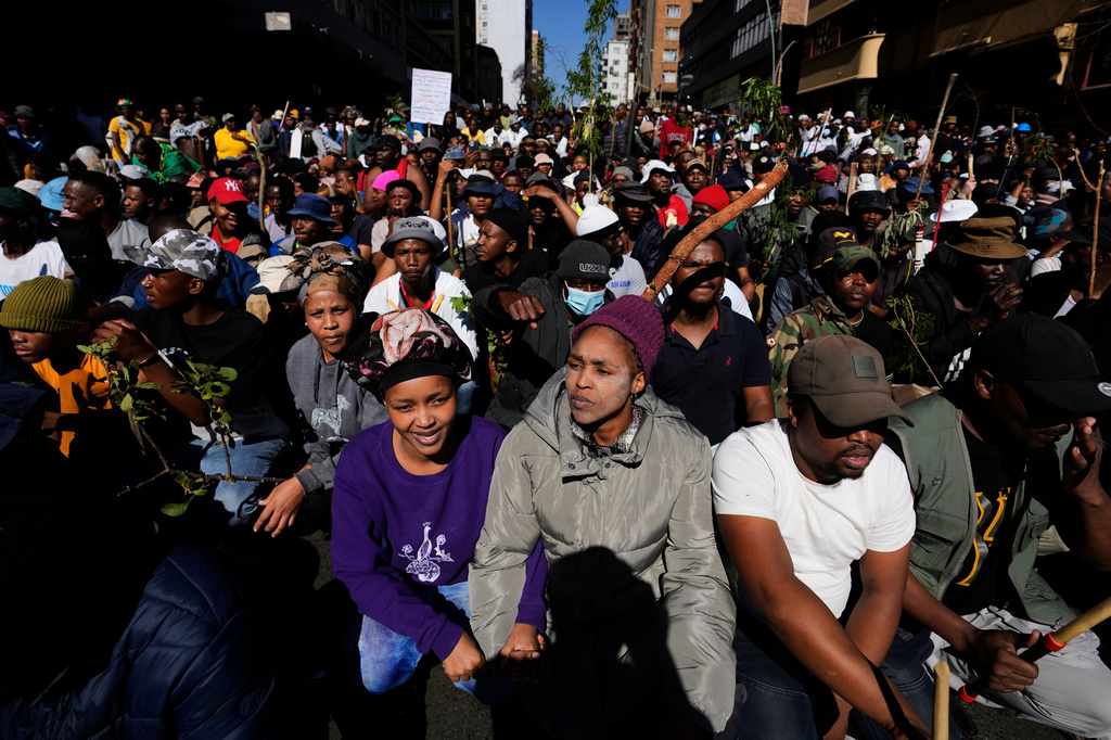 Protesters march against illegal immigration, in Johannesburg, South Africa, Tuesday, June 30, 2026. (AP Photo/Themba Hadebe)