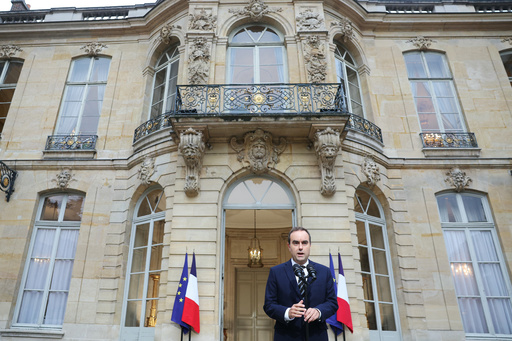 French Prime Minister Sebastien Lecornu delivers a statement at the Hotel Matignon in Paris, Friday Oct. 3, 2025, before a round of consultations with political parties ahead of the announcement of the new government. (Alain Jocard, Pool Photo via AP) French Prime Minister Sebastien Lecornu delivers a statement at the Hotel Matignon in Paris, Friday Oct. 3, 2025, before a round of consultations with political parties ahead of the announcement of the new government. (Alain Jocard, Pool Photo via AP)