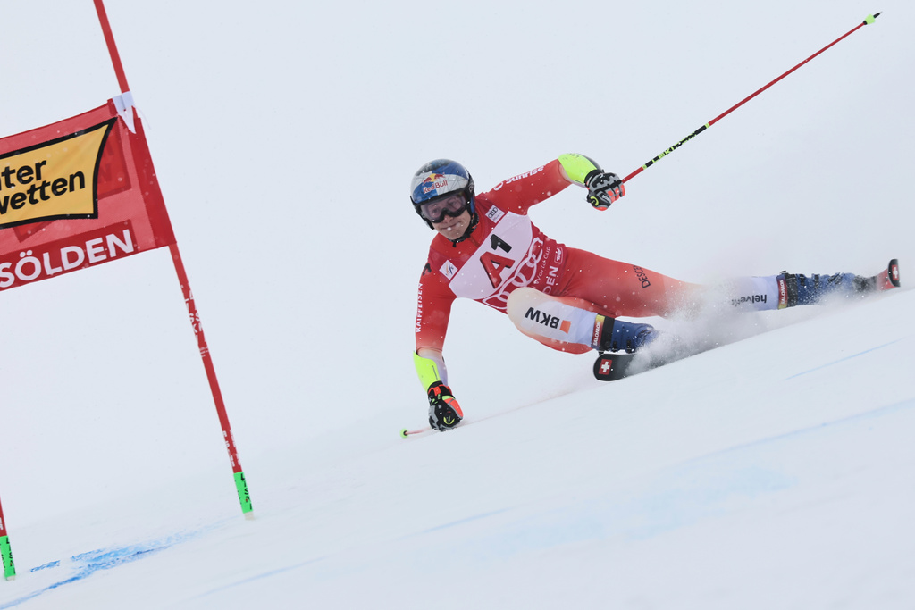 Switzerland's Marco Odermatt competes in an alpine ski, men's World Cup giant slalom, in Soelden, Austria, Sunday, Oct. 26, 2025. (AP Photo/Marco Trovati)