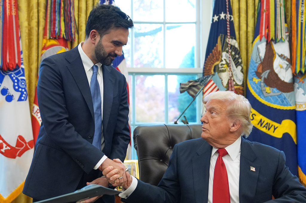 FILE - President Donald Trump shakes hands with New York City Mayor-elect Zohran Mamdani in the Oval Office of the White House, Nov. 21, 2025, in Washington. (AP Photo/Evan Vucci, File)