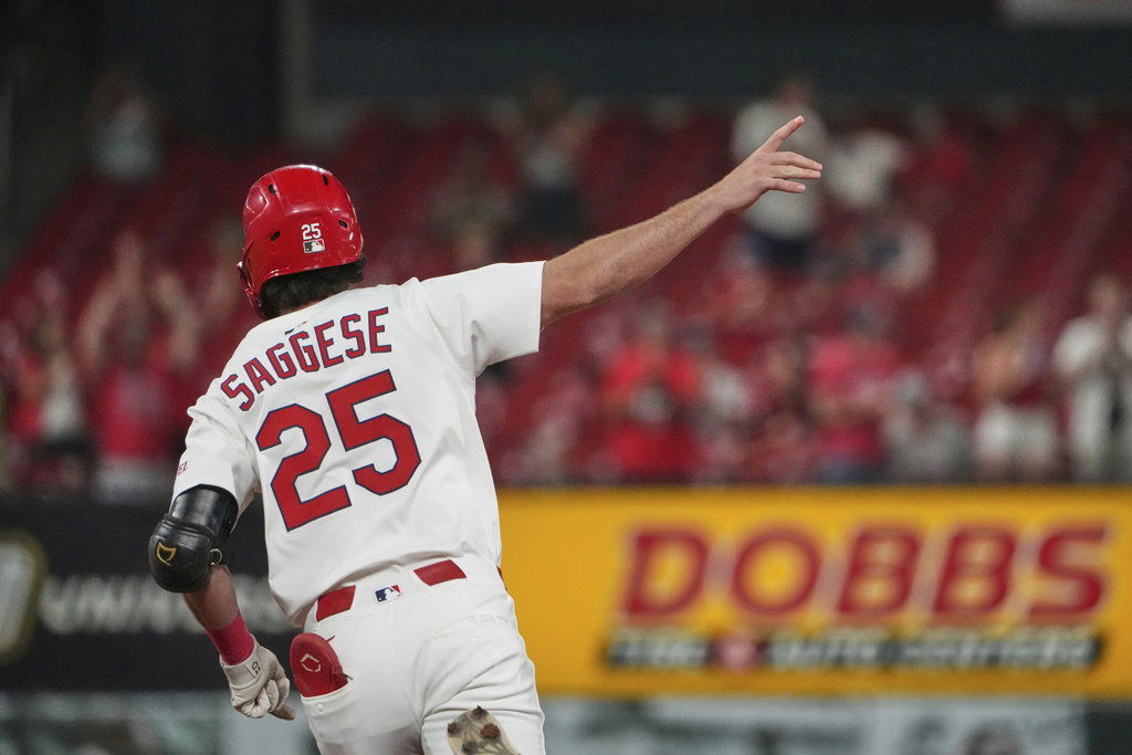 St. Louis Cardinals' Thomas Saggese celebrates as he rounds the bases after hitting a two-run home run during the third inning of a baseball game against the Cincinnati Reds Tuesday, Sept. 16, 2025, in St. Louis. (AP Photo/Jeff Roberson)