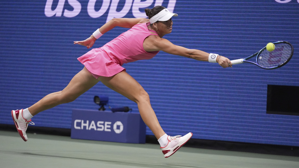 Ajla Tomljanovic, of Australia, returns a shot to Coco Gauff, of the United States, during the first round of the U.S. Open tennis championships, Tuesday, Aug. 26, 2025, in New York. (AP Photo/Frank Franklin II)