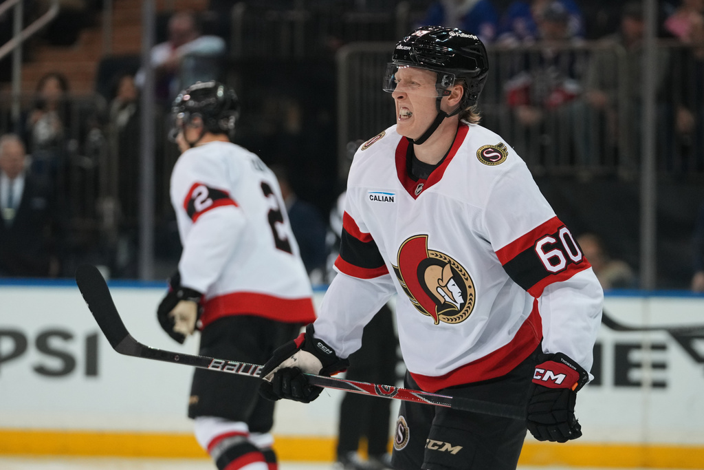Ottawa Senators' Lassi Thomson (60) reacts after getting hurt during the second period of an NHL hockey game against the New York Rangers Monday, March 23, 2026, in New York. (AP Photo/Frank Franklin II)