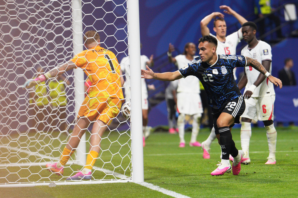 Argentina's Lautaro Martinez (22) celebrates after scoring his side's second goal during the World Cup semifinal soccer match between England and Argentina in Atlanta, Wednesday, July 15, 2026. (AP Photo/Jacob Kupferman)
