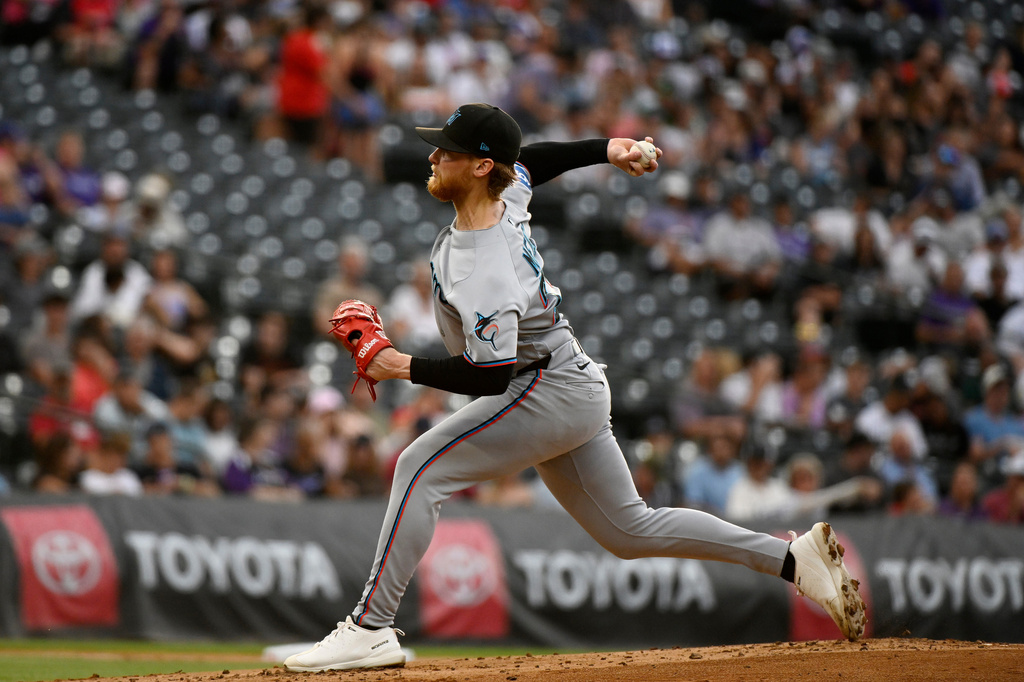 Miami Marlins starting pitcher Max Meyer throws in the first inning of a baseball game against the Colorado Rockies Wednesday, July 1, 2026, in Denver. (AP Photo/Geneva Heffernan)