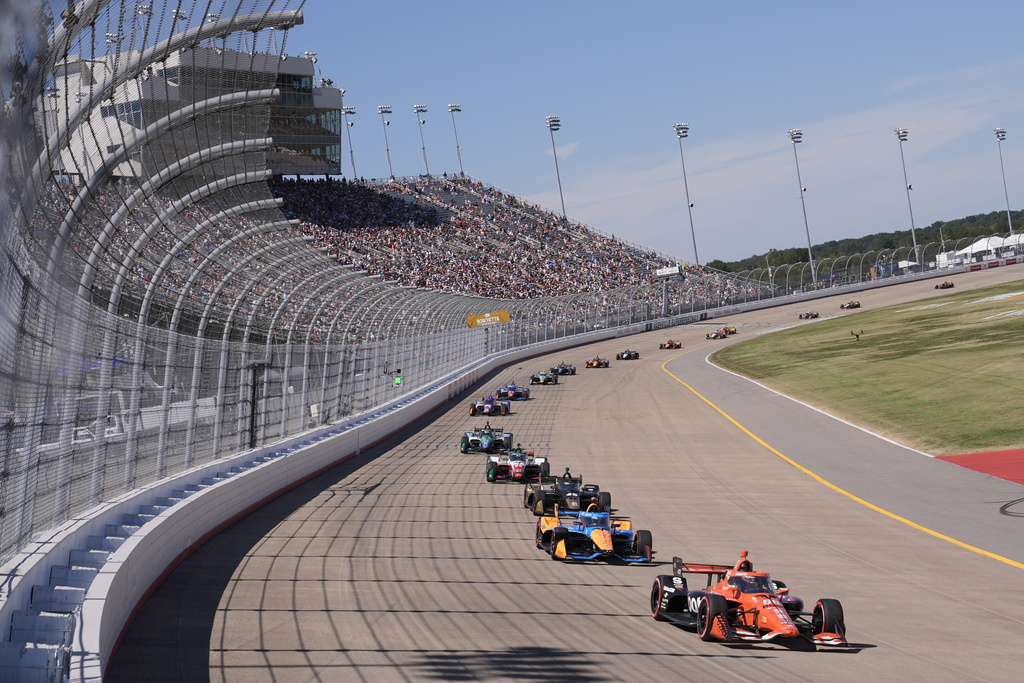 Drivers make their way around the track during an IndyCar auto race Sunday, Aug. 31, 2025, at Nashville Superspeedway in Lebanon, Tenn. (AP Photo/George Walker IV)