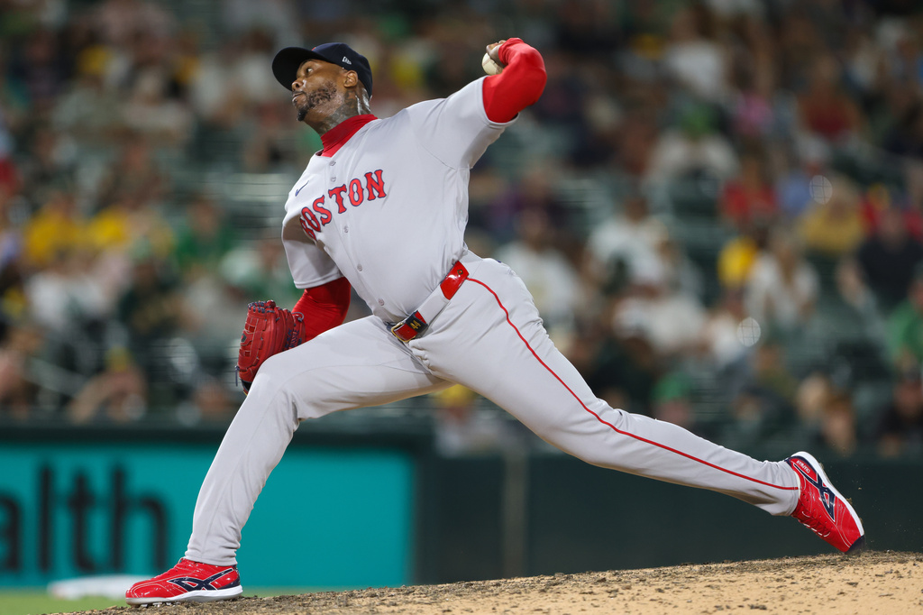 Boston Red Sox's pitcher Aroldis Chapman throws to an Athletics batter during the ninth inning of a baseball game Wednesday, July 29, 2026, in West Sacramento, Calif. (AP Photo/Scott Marshall)