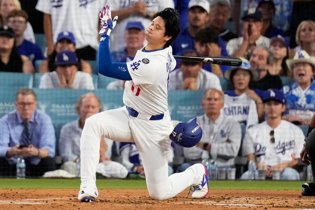 Los Angeles Dodgers' Shohei Ohtani strikes out against the Toronto Blue Jays during the third inning in Game 5 of baseball's World Series, Wednesday, Oct. 29, 2025, in Los Angeles. (AP Photo/Mark J. Terrill)