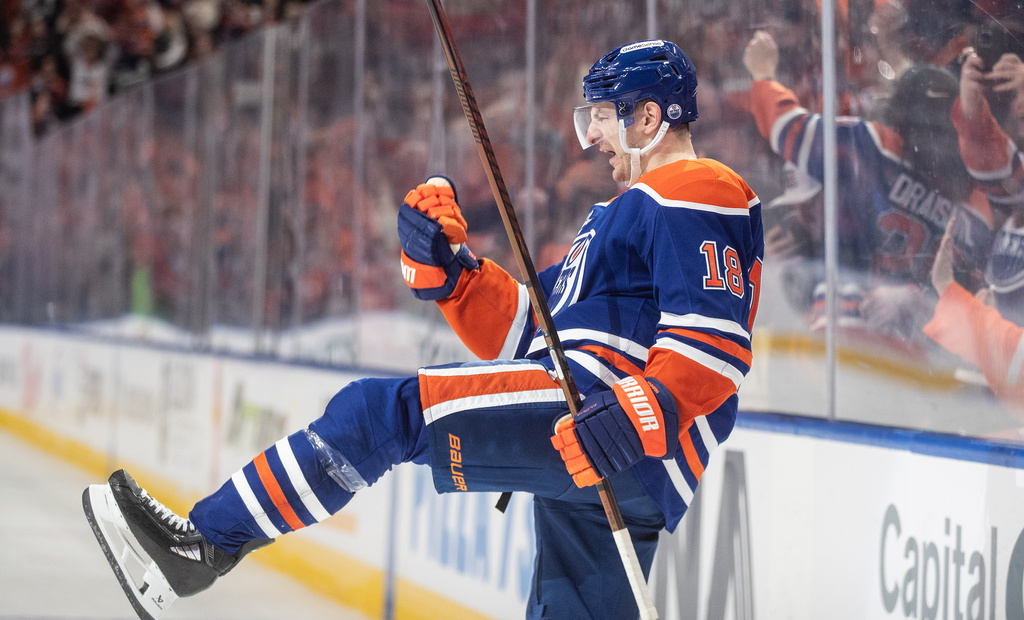Edmonton Oilers' Zach Hyman celebrates a goal against the San Jose Sharks during overtime of an NHL hockey game, in Edmonton, Alberta, Thursday, Jan. 29, 2026. (Jason Franson/The Canadian Press via AP)