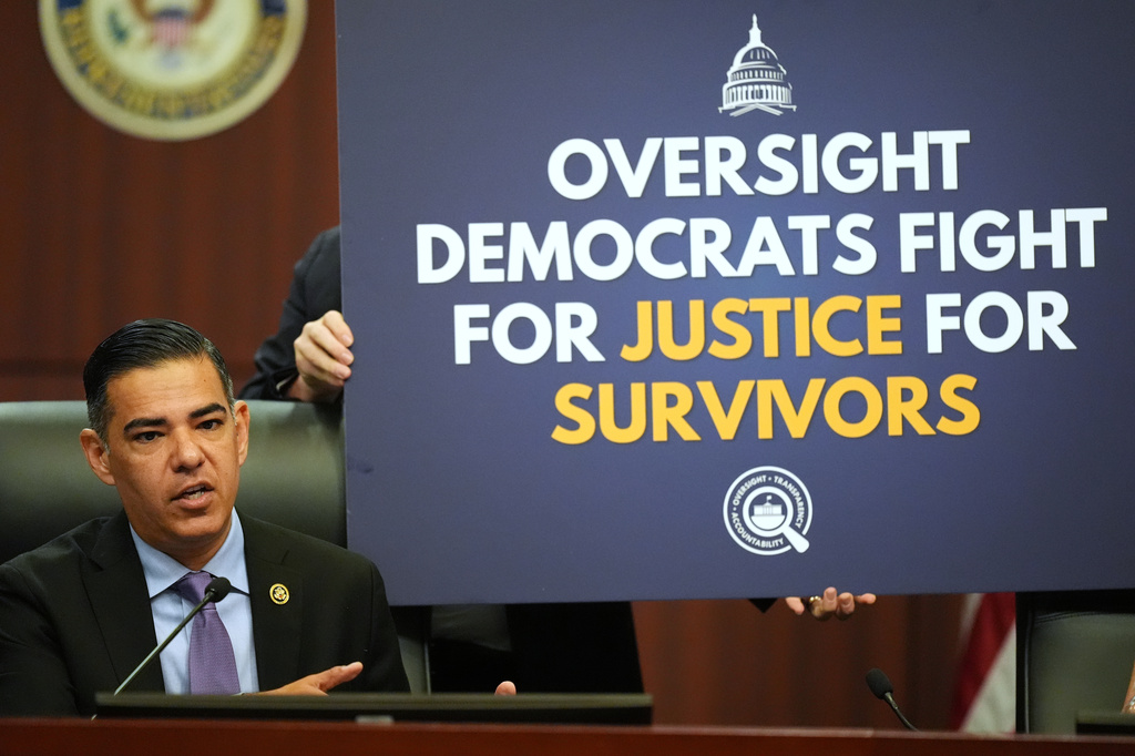 Rep. Robert Garcia, D-Calif., center, speaks during a House Oversight Committee Democrats' field hearing focused on the Epstein Investigation, Tuesday, May 12, 2026, in West Palm Beach, Fla. (AP Photo/Rebecca Blackwell)