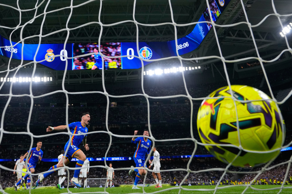 Getafe's Satriano celebrates the opening goal during a Spanish La Liga soccer match between Real Madrid and Getafe in Madrid, Spain, Monday, March 2, 2026. (AP Photo/Manu Fernandez)